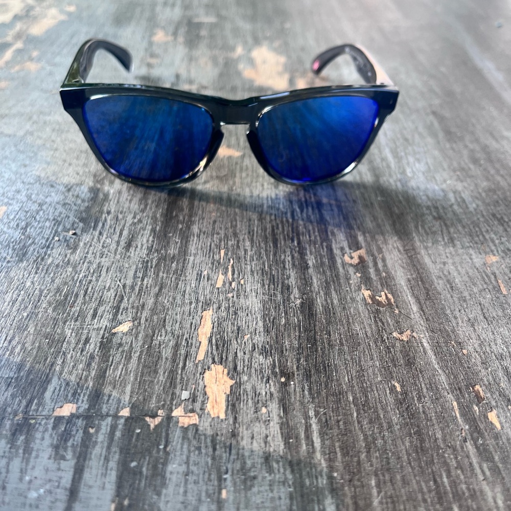 Oakley black Sunglasses with blue lenses. Small frame